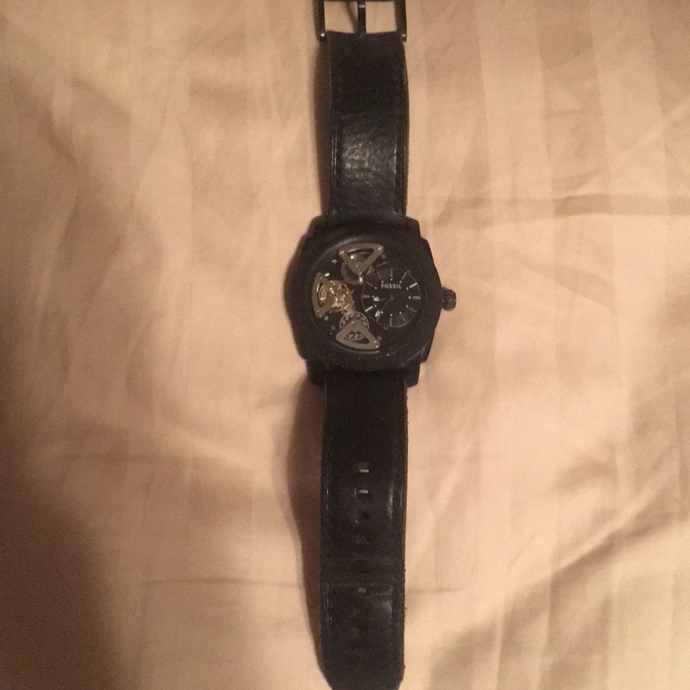 Perpetual moving fossil watch